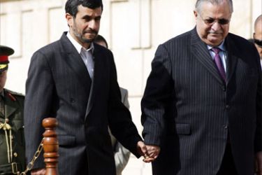 Iranian President Mahmoud Ahmadinejad (L) is greeted his Iraqi counterpart Jalal Talabani at his Baghdad residence on March 2, 2008.