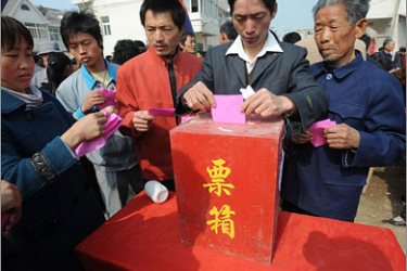 AFP Chinese villagers cast their votes for local leaders in Wuhu, eastern China's Anhui province on March 20, 2008. Corruption, vote-rigging and gangsterism