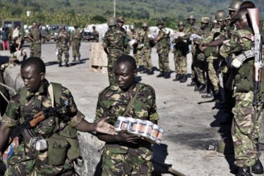 Tanzanian African Union (AU) troops disembark in the port of Fomboni, the capital of Moheli, on 20 March 2008.