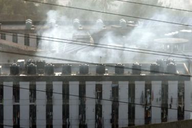 AFP/ Smoke rises from the prison of Rumieh, northeast of Beirut on April 24, 2008. Prisoners took seven warders hostage in a mutiny at Lebanon's Rumieh prison today, a security official told AFP