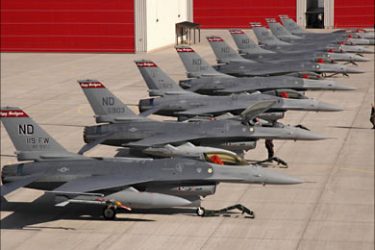 r_U.S. Air Force F-16 Fighting Falcon aircraft from the 119th Maintenance Group are lined up on the flight line at a North Dakota Air National Guard base in Fargo, N.D., in this