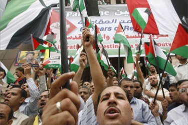 Egyptian demonstrators shout pro-Palestinian and anti-Bush slogans at the lawyers syndicate in Cairo May 15, 2008, as they mark the 60th anniversary of the founding of Israel and to protest U.S. President George W. Bush's visit to Egypt on Saturday.
