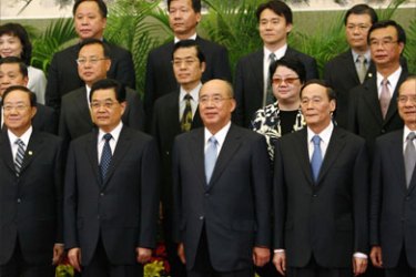 Wu Poh-Hsiung (C), Chairman of Taiwan's ruling Nationalist Party, or Kuomintang (KMT), stands with Chinese President Hu Jintao (2nd L) during a group photograph in the Great Hall of the People in Beijing May 28, 2008