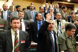 Egyptian Muslim Brotherhood MPs react during a parliamentary session held in Cairo on May 26, 2008 to extended a controversial decades-old state of emergency