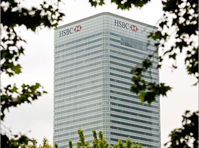 . REUTERS/ The HSBC building is seen in the Canary Wharf district, in East London on May 30, 2008. REUTERS/Alessia Pierdomenico (BRITAIN)