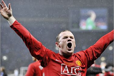 AFP (FILES) This file photo taken on May 21, 2008 shows Manchester United's English forward Wayne Rooney celebrating after beating Chelsea in a penalty shoot out to win the final of the UEFA Champions League football match at the Luzhniki stadium in Moscow. It was reported on June 12, 2008 that Rooney and his long-time girlfriend Coleen