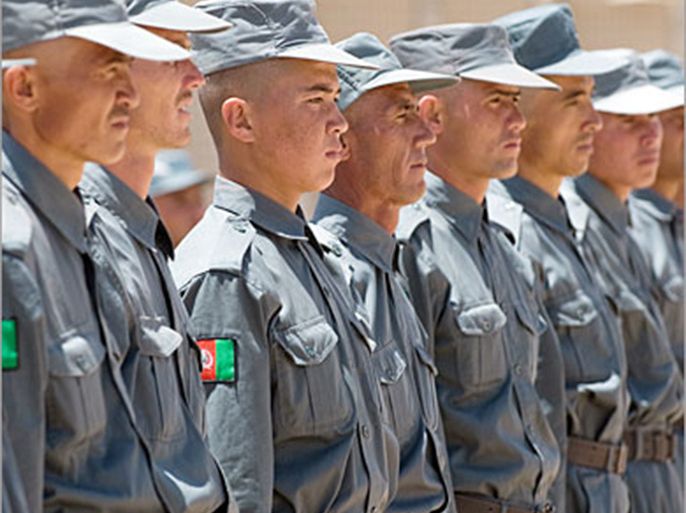 AFP - Recruits of a police training academy in the Bamiyan Province, Afghanistan await a visit by US First Lady Laura Bush, June 8, 2008. The surprise visit marks the third time