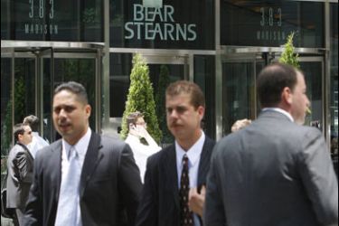 REUTERS/Employees leave the Bear Stearns company headquarters in New York in this file photo taken on May 29, 2008.