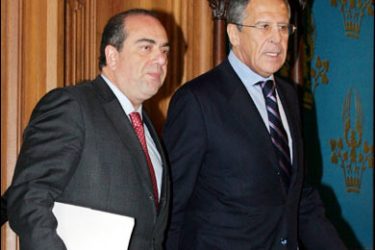 F/Russian Foreign Minister Sergei Lavrov (R) and his Cypriot counterpart Markos Kyprianou (L) enter a hall to give a speech after talks in Moscow on June 9, 2008.