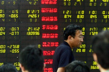 AFP/ Chinese stock investors check the prices of their shares at a security firm in Beijing on June 10, 2008. Chinese share prices tumbled to close 7.73 percent down
