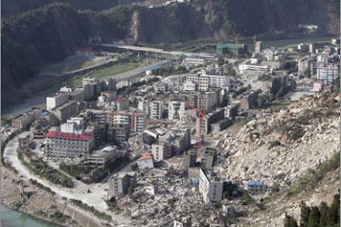 REUTERS/A general view shows a landslide which buried part of earthquake-hit Beichuan in Sichuan province June 7, 2008. Chinese troops on