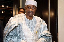 afp : Malian President Amadou Toumani Touré leaves the main assembly room after the afternoon session of the 11th African Union Summit in the Sinai resort town of Sharm el-