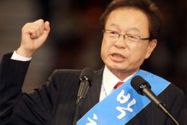 Park Hee-Tae, new chairman of the ruling Grand National Party, gestures during the party's national convention in Seoul on July 3, 2008.