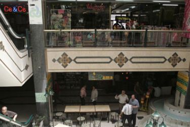 Palestinians visit the shopping mall in the West Bank city of Nablus July 8, 2008. Israeli forces raided a popular shopping mall in the occupied West Bank on Tuesday,