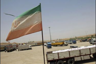 AFP PHOTO/Iranian and Iraqi vehicles are seen at the Parviz Khan border point in Qasre Shirin western Iran on July 12, 2008.