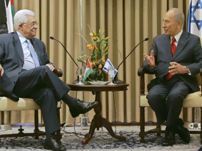 Israel's President Shimon Peres and Palestinian President Mahmoud Abbas (L) sit together during their meeting in Jerusalem July 22, 2008. Peres hosted Abbas for talks
