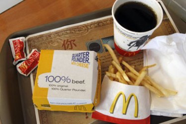 A meal consisting of a Quarter Pounder hamburger, french fries and soft-drink is pictured at a McDonald's restaurant in Los Angeles, California July 23, 2008. McDonald's