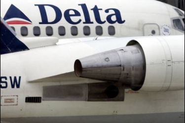 F/(FILES) A Delta Airlines aircraft at Dulles International Airport in Chantilly, Virginia sits in this 28 March 2007 file photo. Delta Air Lines said on July 16,2008 it had a large loss in the second quarter despite a strong increase in sales,