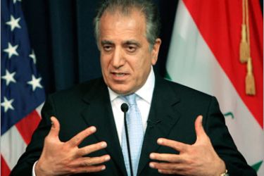 epa00967584 The departing US ambassador to |raq Zalmay Khalilzad gestures during a press conference in the heavily fortified Green Zone in Baghdad Monday, March 26, 2007.