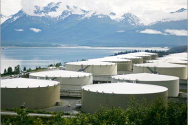 REUTERS/ A field of 14 storage tanks that each hold 510,000bbls of oil can be seen at the Trans-Alaska Pipeline Marine Terminal in Valdez, Alaska on August 8, 2008. REUTERS/Lucas
