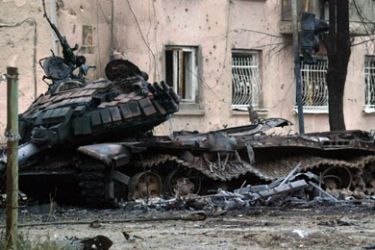 A destroyed Georgian tank is seen at a street in the South Ossetian capital of Tskhinvali, August 9, 2008.