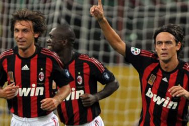 AC Milan's forward Filippo Inzaghi (R) celebrates after scoring with AC MIlan's midfielder Andrea Pirlo (L) and AC MIlan's midfielder Clarence Seedorf of Netherland (C)