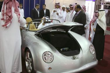 Saudis look at the PGO-Cevennes car during the opening ceremony of the Riyadh car exhibition in this December 9, 2007 file photo. With inflation rising across the Gulf Arab