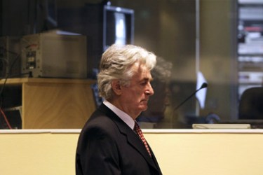 Bosnian Serb wartime leader Radovan Karadzic arrives in the UN's Yugoslav warcrimes court in The Hague on August 28, 2008 for his second appearance before the court which