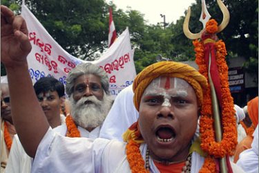 REUTERS/A priest shouts during a protest against the killing of a Hindu leader in the eastern Indian city of Bhubaneshwar August 26, 2008. Authorities imposed