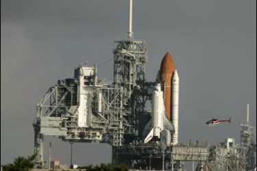 epa01499456 (FILE) In this file photo taken 19 September 2008 Space shuttle Endeavour (R) the rescue shuttle for the space shuttle Atlantis (L), STS-125 mission sits on launch pad 39-B and 30-A at Kennedy Space Center, Cape Canaveral, Florida, USA. NASA announced on 24 September 2008 that the launch of Atlantis to do repairs on the Hubble Space Telescope will be delayed until 14 October 2008