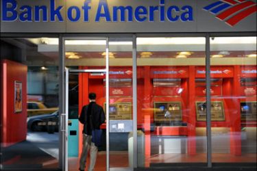 afp : A man walks into a branch of Bank of America September 17, 2008 in the lower Manhattan area of New York. Bank of America announced September 15, it was