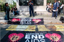 AFP - AIDS activist meet at a park within Cadman Plaza before cross the Brooklyn Bridge September 18, 2008 in the Brooklyn borough of New York City.Activists assembled at