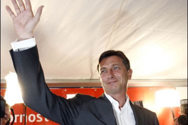 r/Leader of Social democrats (SD) party Borut Pahor celebrates first place, after the general elections, in Ljubljana September 21, 2008.