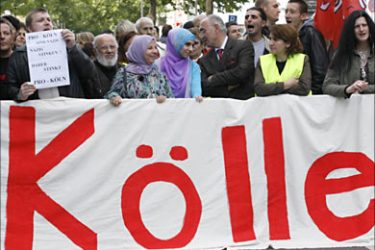 r_Left wing protestors demonstrate with a banner reading 'Cologne' in front of a mosque at the Islamic centre in the Cologne suburb of Ehrenfeld September