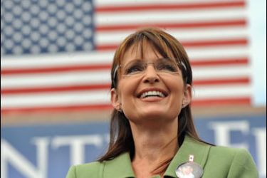 f/Republican vice president cadidate Sarah Palin smiles as she arrives for a campaign rally at the the Home DepotCenter in Carson on October 4, 2008
