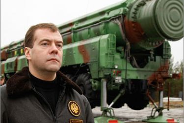 AFPRussian President Dmitry Medvedev walks near RS-12M Topol ballistic missile at the Plesetsk space lunch pad on October 12, 2008.