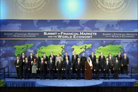 r_Leaders pose for a group photo at the G20 Summit on Financial Markets and the World Economy at the National Building Museum in Washington, November 15, 2008