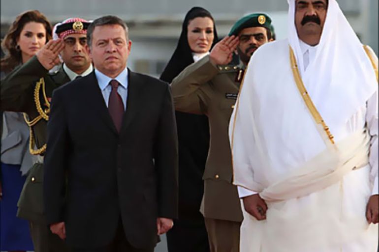 f_A handout picture from the Jordanian Royal Palace shows Emir of Qatar Sheikh Hamad bin Khalifa al-Thani (R), his wife Sheikha Moza (back row-R), Jordan's King Abdullah