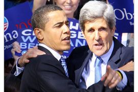 AFP(FILES) Dated January 10, 2008 file photo shows then US Democratic presidential hopeful Barack Obama (L) is greeted by former presidential candidate Senator John Kerry