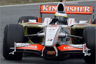 REUTERS - McLaren Formula One test driver Pedro de la Rosa drives a Force India car during a testing session at the Catalonia racetrack in Montmelo near Barcelona November 18, 2008