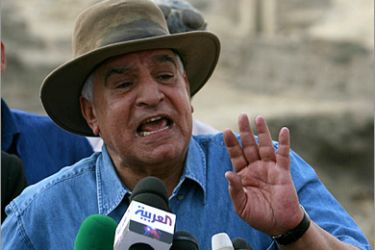 AFP - Zahi Hawass, the secretary general of Egypt's Supreme Council of Antiquities, addresses the media on November 11, 2008 next to the newly discovered pyramid at an ancient