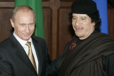Russia's Prime Minister Vladimir Putin (L) meets Libyan leader Muammar Gaddafi in Moscow, November 1, 2008. Gaddafi said on Saturday he wanted closer energy ties with
