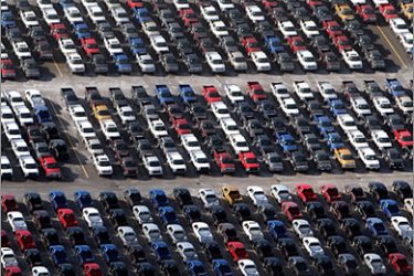 AFPDETROIT - NOVEMBER 21: Numerous 2009 Ford F-150 trucks are parked in a lot before being shipped on November 21, 2008 in Detroit, Michigan. As car and truck