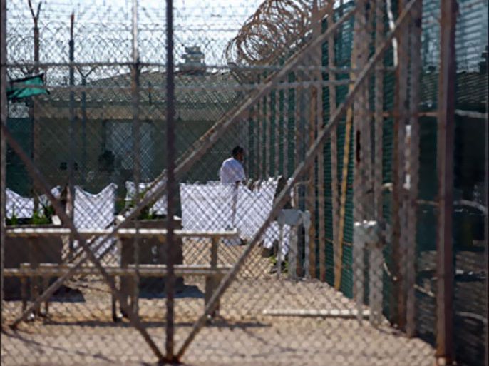afp : In this image reviewed by the US military, an unidentified detainee at the "Camp Four" detention facility December 10, 2008 at the US Naval Station in Guantanamo Bay, Cuba.