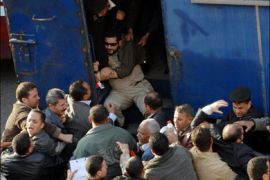 afp : Egyptian policemen, some in civil clothes, arrest protestors of the Muslim Brotherhood during a demonstration in front the lawyers syndicate in downtown Cairo on
