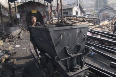 A rescuer prepares to go down Guaziyan coal mine where a gas blast occurred in Lianyuan, Hunan province December 18, 2008