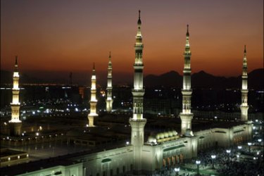 afp : Muslim pilgrims attend sunset prayers at the Prophet Mohammed Mosque in the Saudi holy city of Medina on December 13, 2008. Statistics put the total number of