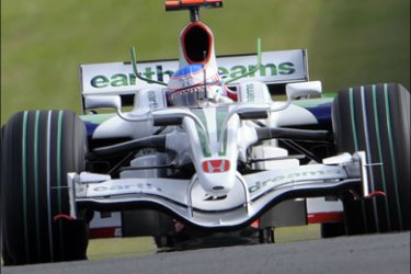 afp : (FILES) A picture taken on October 11, 2008 shows Britain's Jenson Button of Honda speeding during the qualifying practice session of the Japanese Formula One