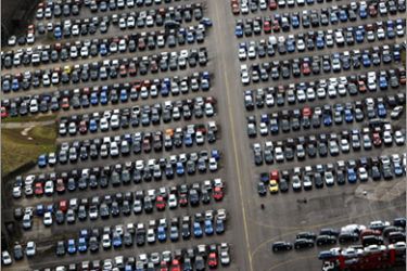 AFPThousands of cars are stored on the runway at the disused Upper Heyford airbase near Bicester, Oxfordshire, on December 18, 2008. The British car industry has become the latest sector hit by the global slowdown, as figures showed new vehicle