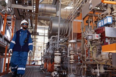 r_A technician inspects the Krechba gas treatment plant, about 1200 km (746 miles) south of Algiers December 14, 2008. Algeria has approved or plans to approve projects expected